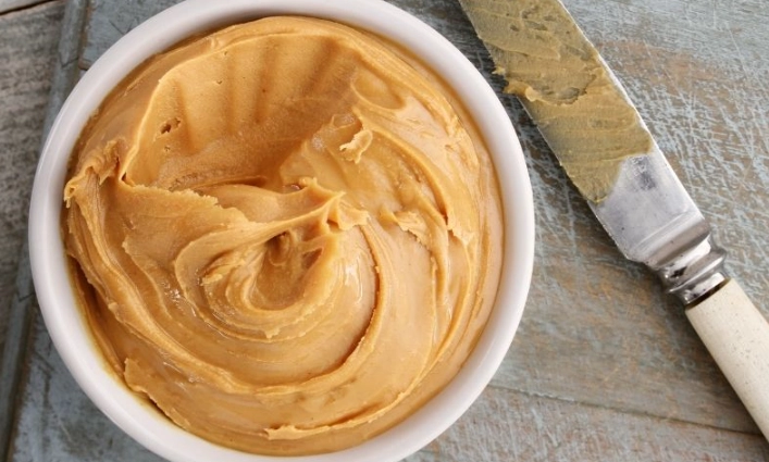 how much peanut butter per day