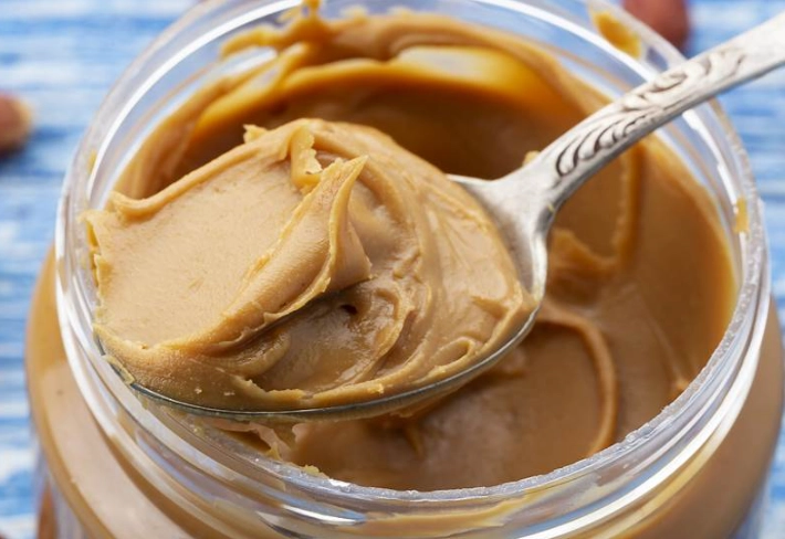 how much peanut butter per day
