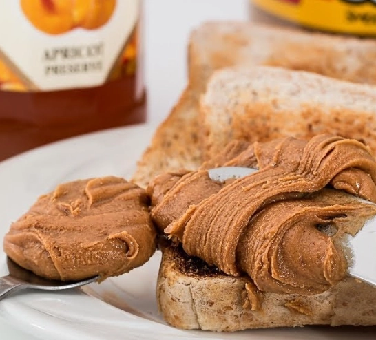 how many calories in a cup of peanut butter